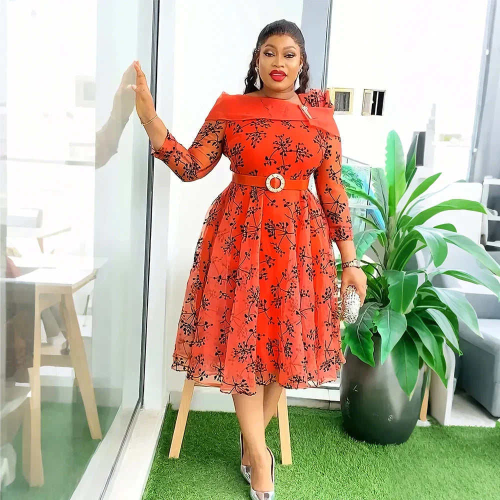 African print maxi dress by SHOWLU FASHION STORE, elegant plus size party gown with vibrant African-inspired patterns and flowing fabric.