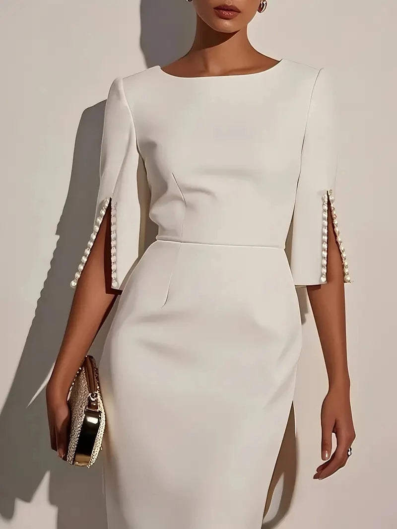 Showlu Women's beaded round neck slim fit midi sheath office dress, featuring intricate bead detailing and tailored silhouette.