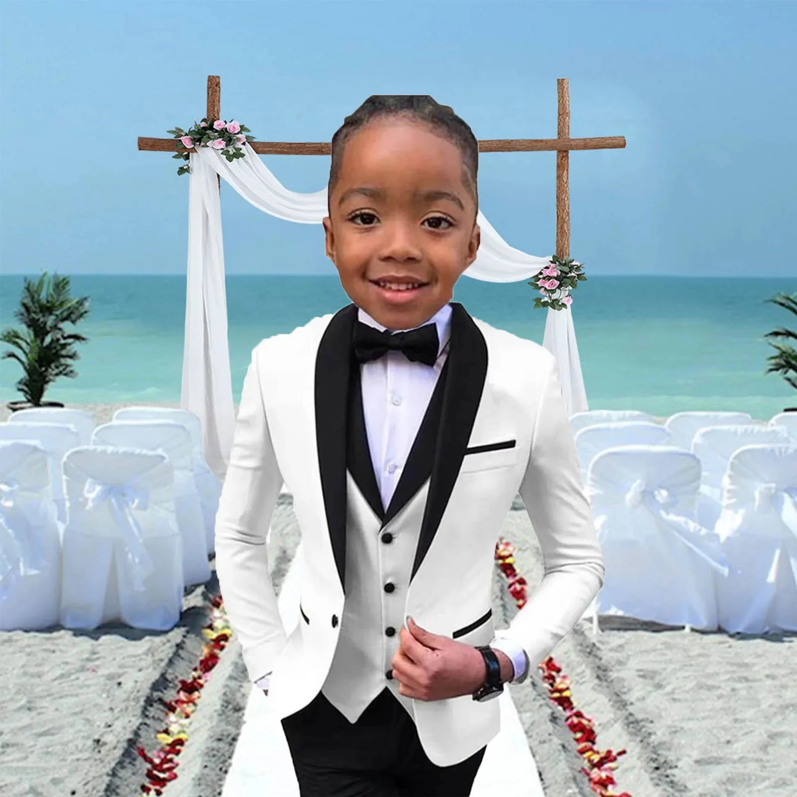 Boy wearing a slim fit white suit with jacket, vest, pants, and bowtie from PsyMonster by SHOWLU FASHION STORE.