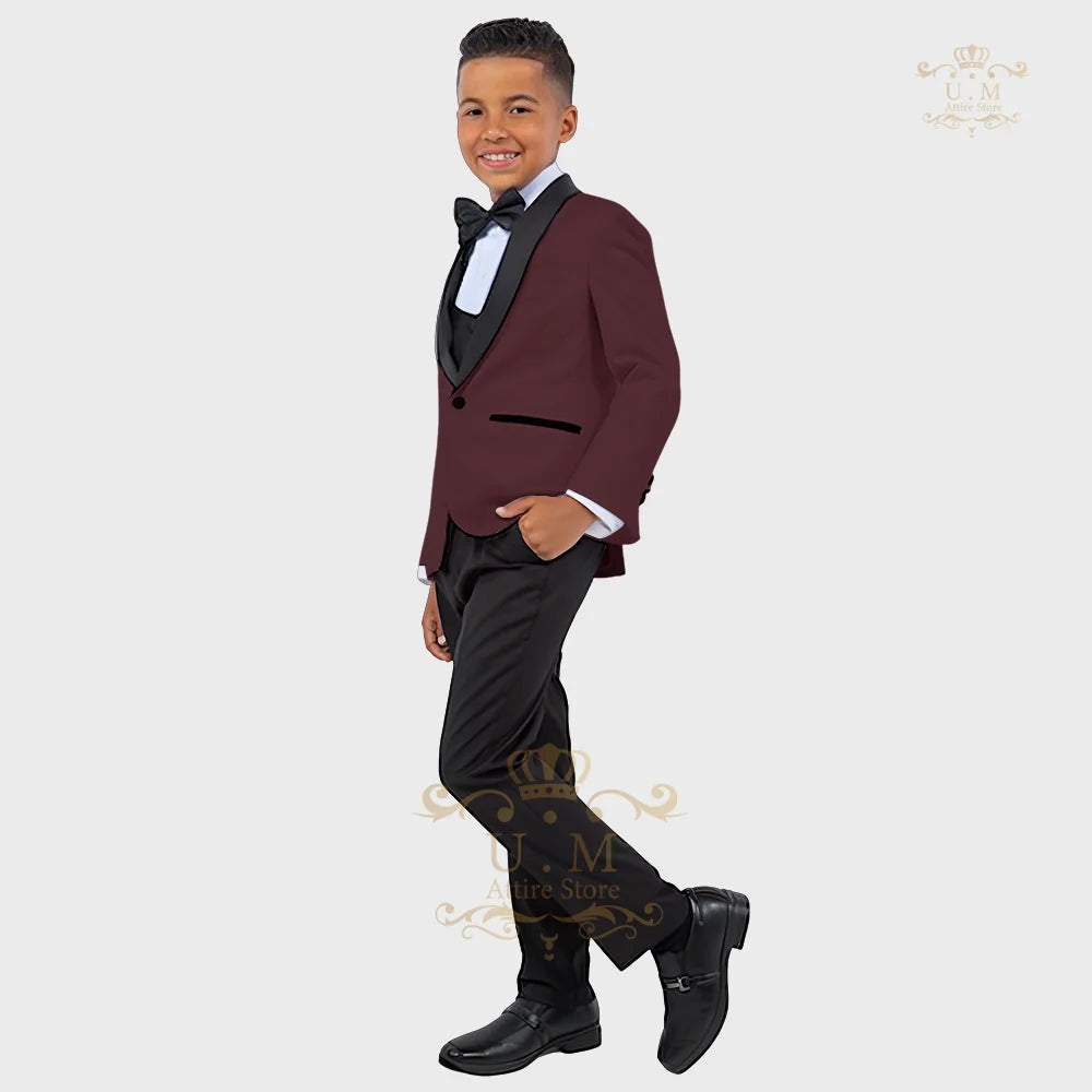 Boy wearing a white tuxedo suit with jacket, vest, and pants, perfect for formal occasions, by SHOWLU FASHION STORE.