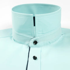 A light blue long-sleeve dress shirt featuring a high collar with dark contrasting trim.