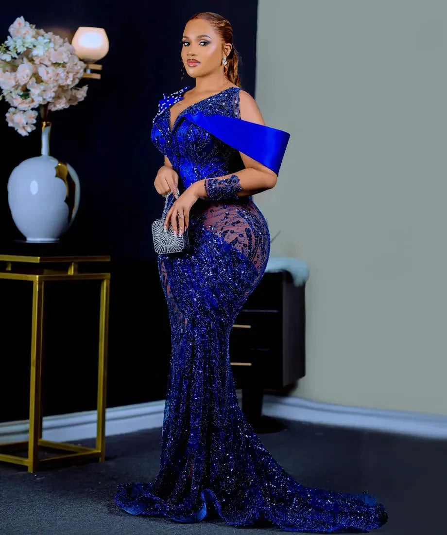Royal blue Katristsis mermaid prom dress with beaded lace details, elegant evening gown featuring fitted silhouette and intricate embellishments.
