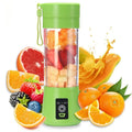 Portable mini USB juicer blender from Showlu Fashion Store, showing compact design and stainless steel blending chamber.