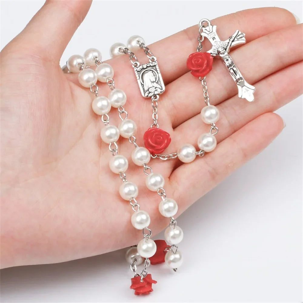 Pink rosary necklace for women with rose glass beads, crucifix cross pendant, and INRI inscription, long religious jewelry.