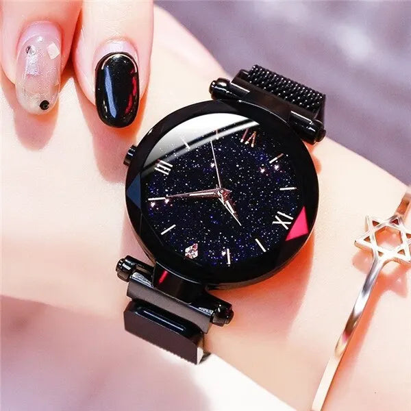 Women's starry sky quartz watch with diamond accents, mesh strap, magnet buckle, suitable for dress and fashion wear.