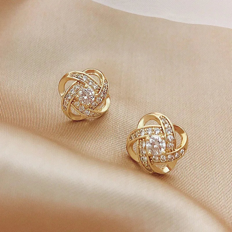 Showlu Fashion zircon cross stud earrings featuring geometric copper design, perfect for stylish, modern jewelry accessorizing.