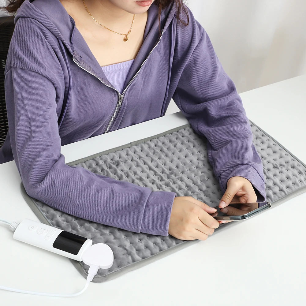 Showlu Smart Electric Heating Pad with adjustable temperature, timer, plush surface, and warm comfort for soothing relief.