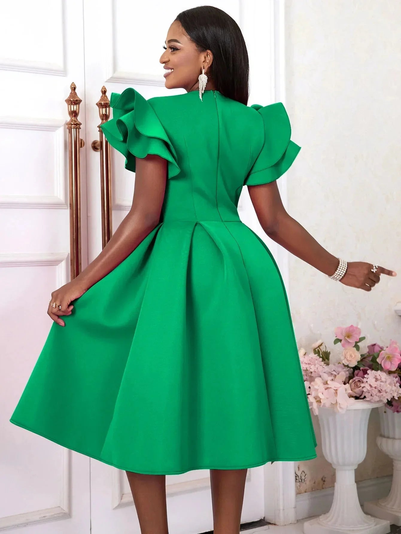 AOMEI women's sweetheart neckline fit and flare pleated skater dress in black, featuring a feminine design and flared hem.