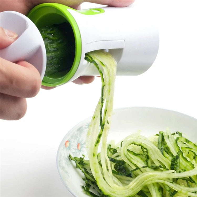 Stainless steel vegetable spiralizer with 3 blades from Showlu Smart General, showing the spiralized vegetables and slicer in use.
