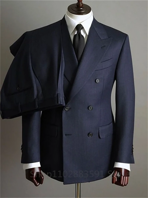 Two-piece men's tuxedo blazer and pants set with double-breasted buttons and peaked lapels, suitable for formal events and weddings.