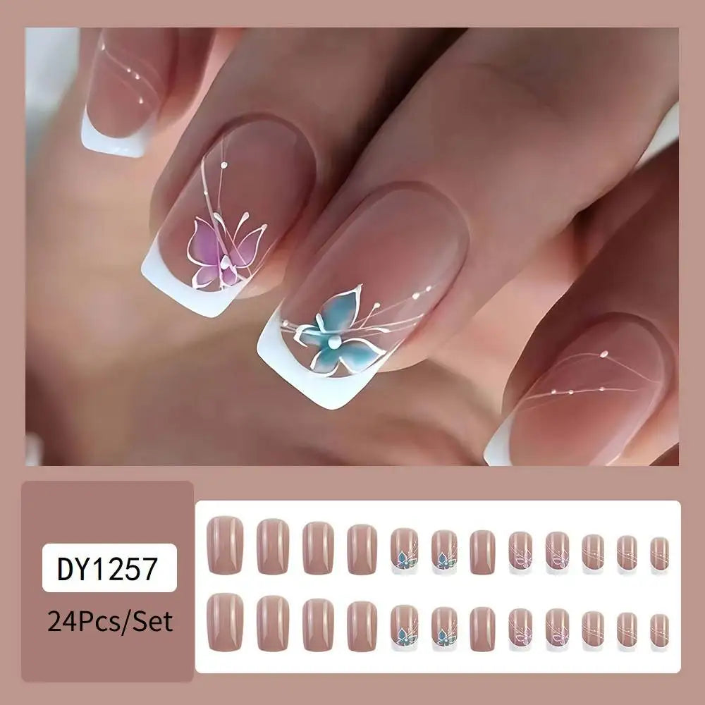 Set of 24 short square artificial fake nails with French white and pink design, reusable acrylic false nails with butterfly accents.