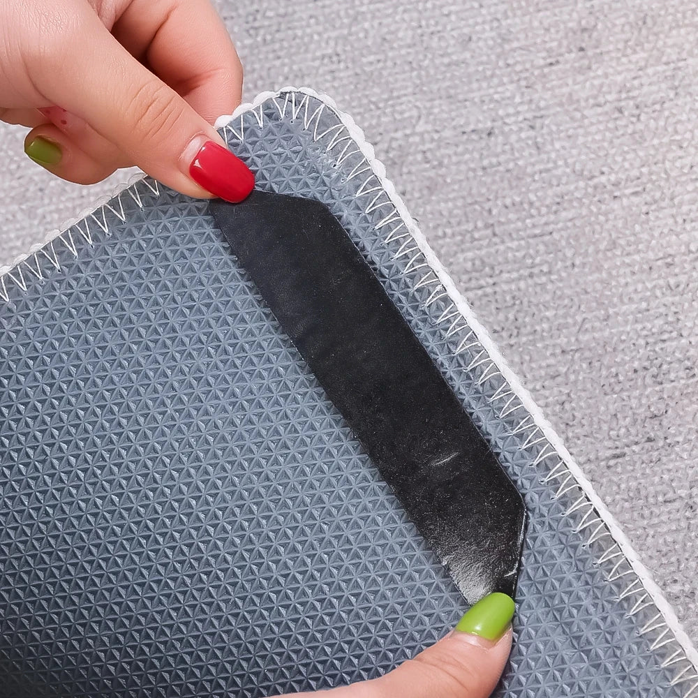 Showlu Smart General anti-slip rug grippers securing a rug on the floor for safety and stability.