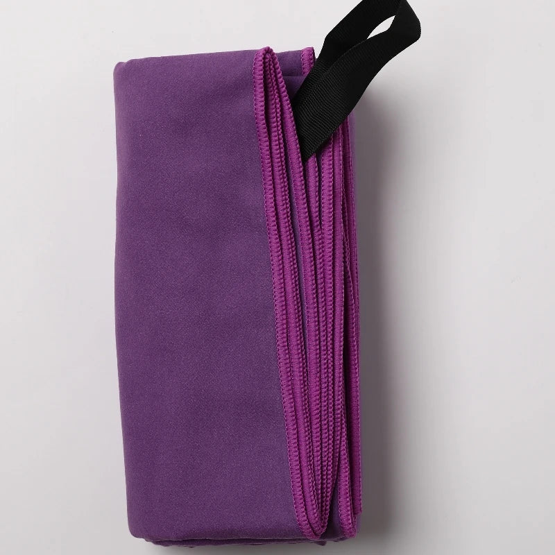 Soft microfiber sports towel by Stone's Store, lightweight and quick-drying for gym, swimming, yoga, beach, and camping activities.