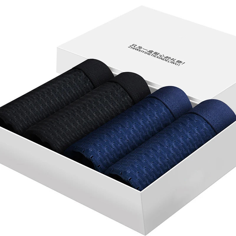 Men's ice silk boxer shorts by Showlu Fashion Store, breathable mesh underwear, 4-pack, comfortable and lightweight for everyday wear.