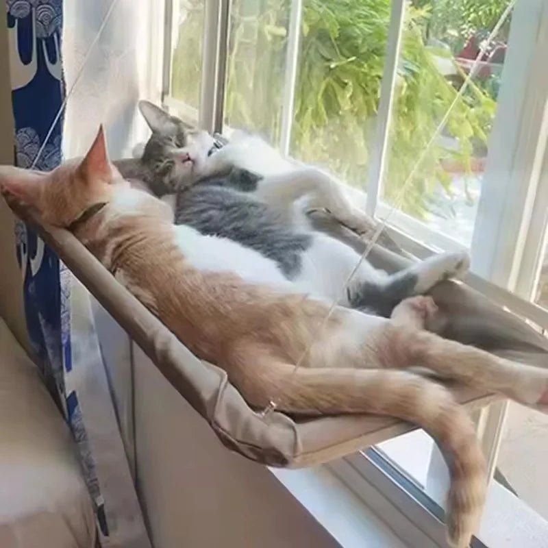 Showlu Cat Window Hanging Hammock Bed made of Oxford fabric, space-saving perch for cats to relax and enjoy window views.