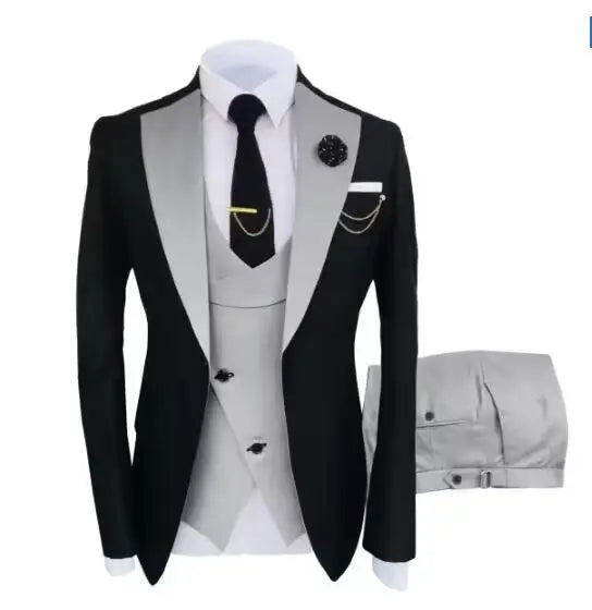 Elegant men's tuxedo suit by Showlu Fashion, featuring a jacket, trousers, and vest for formal parties or groomsmen attire.