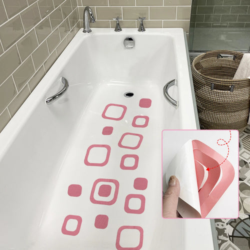 Showlu Smart General anti-slip bath stickers on a bathtub surface for safety and grip, featuring colorful, textured adhesive strips.