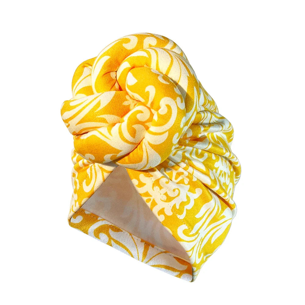 SHOWLU Knotted Head Wrap with luxury floral design, stylish polyester party headdress featuring intricate knot detail and vibrant floral pattern.
