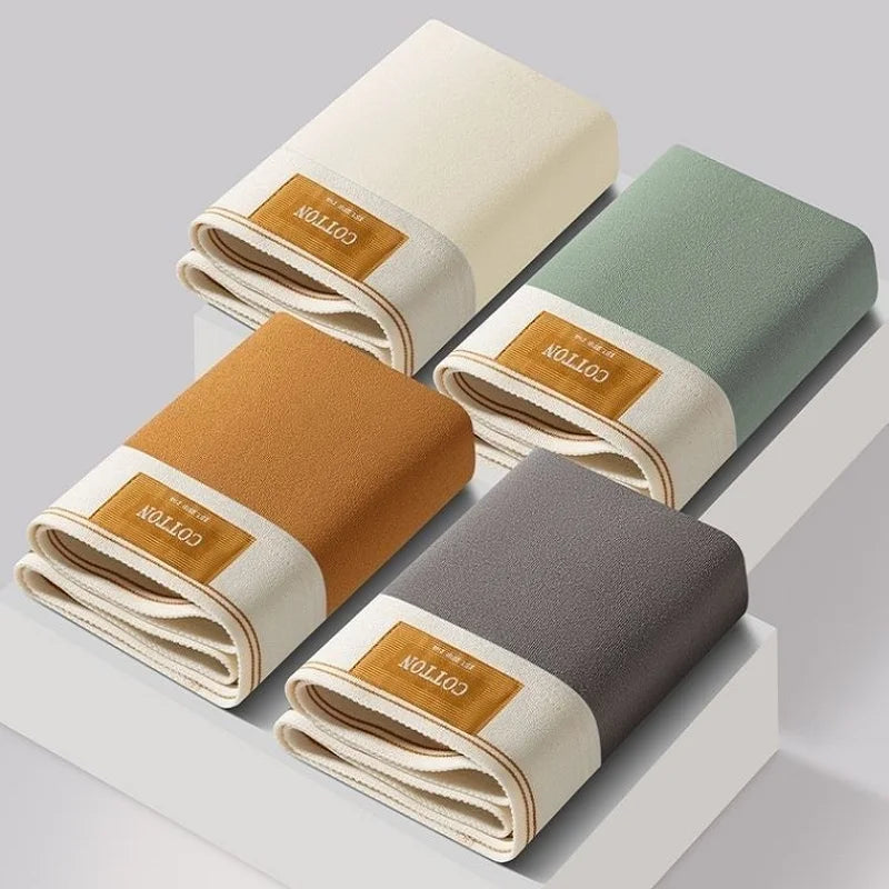 Set of four men's cotton boxer shorts from Showlu Fashion, breathable, comfortable, large size L-7XL, in classic styles.