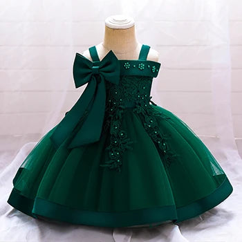 Baby girl wedding dress by Showlu Fashion Store with a big bow, long sleeves, and elegant design for special occasions.