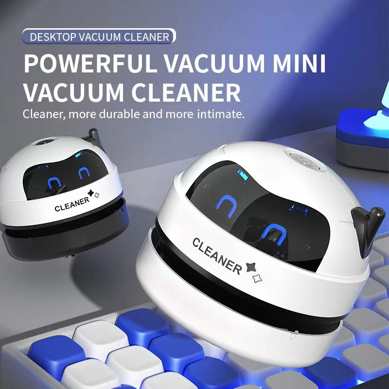 Showlu Smart General Mini USB Robot Desk Vacuum cleaning a keyboard with its small robotic design and compact size.