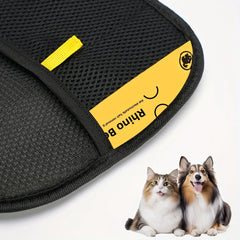 A black mesh pet hair removal glove with a yellow label sits next to a cat and a dog.