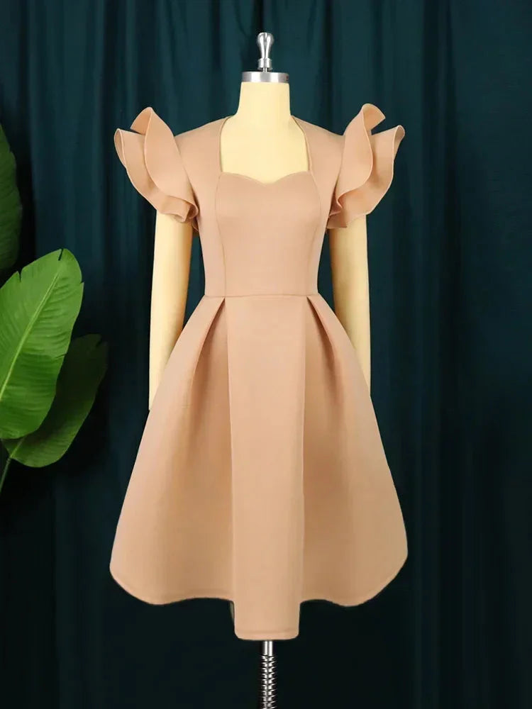 A stylish AOMEI women's sweetheart neckline fit and flare pleated skater dress in black, showcasing its elegant design and flowing skirt.