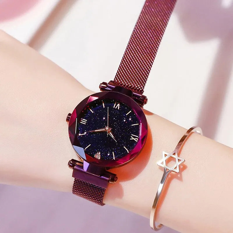 Women's starry sky fashion watch with diamond accents, mesh belt, magnet buckle, quartz movement, suitable for dressy occasions.