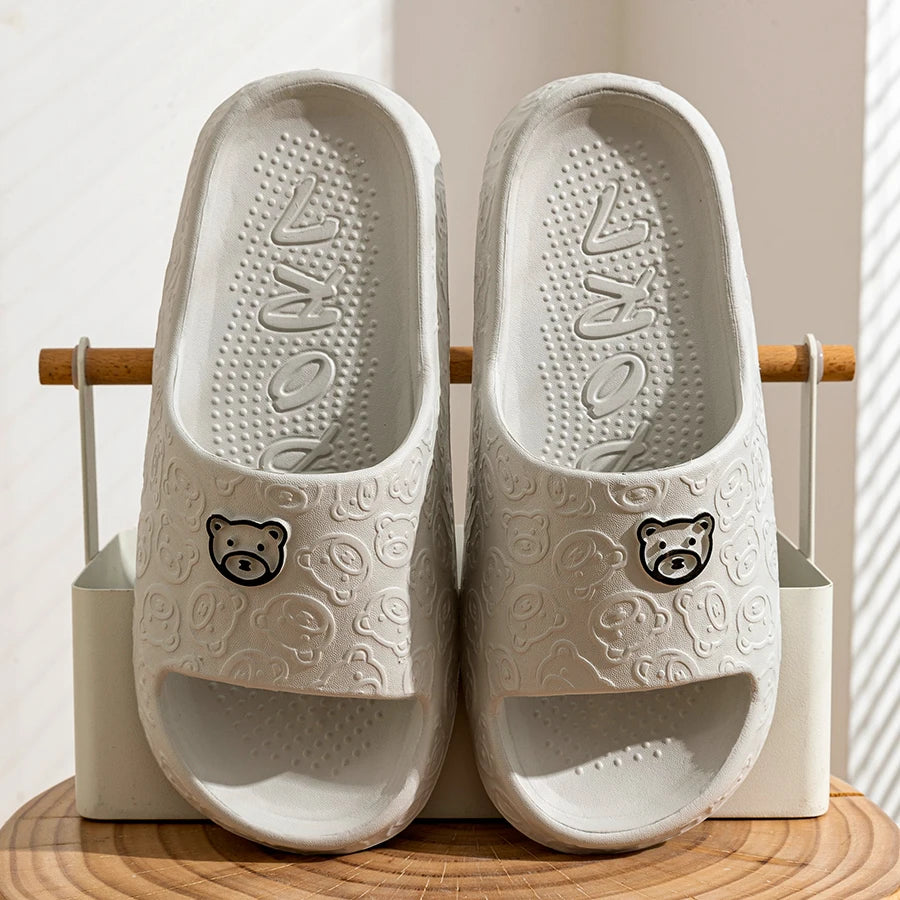 Showlu Fashion men's summer slippers with bear print, non-slip soft indoor sandals for bathroom or casual wear.