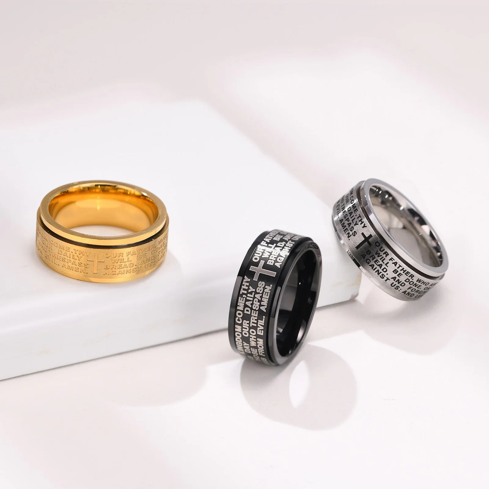 Stainless steel Vnox 8mm spinner cross ring for men featuring a prayer band design and religious symbols.