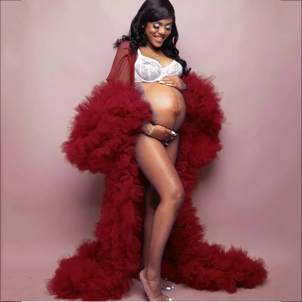 Showlu Fashion deep V-neck maternity dress with lace, tulle, long sleeves, feather details, ideal for photos and special occasions.