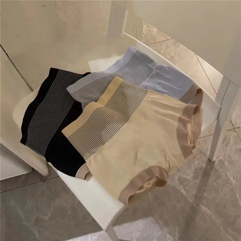 Women’s high waist shaping panties by Showlu Fashion, seamless breathable body shaper with tummy control and butt lifting features.