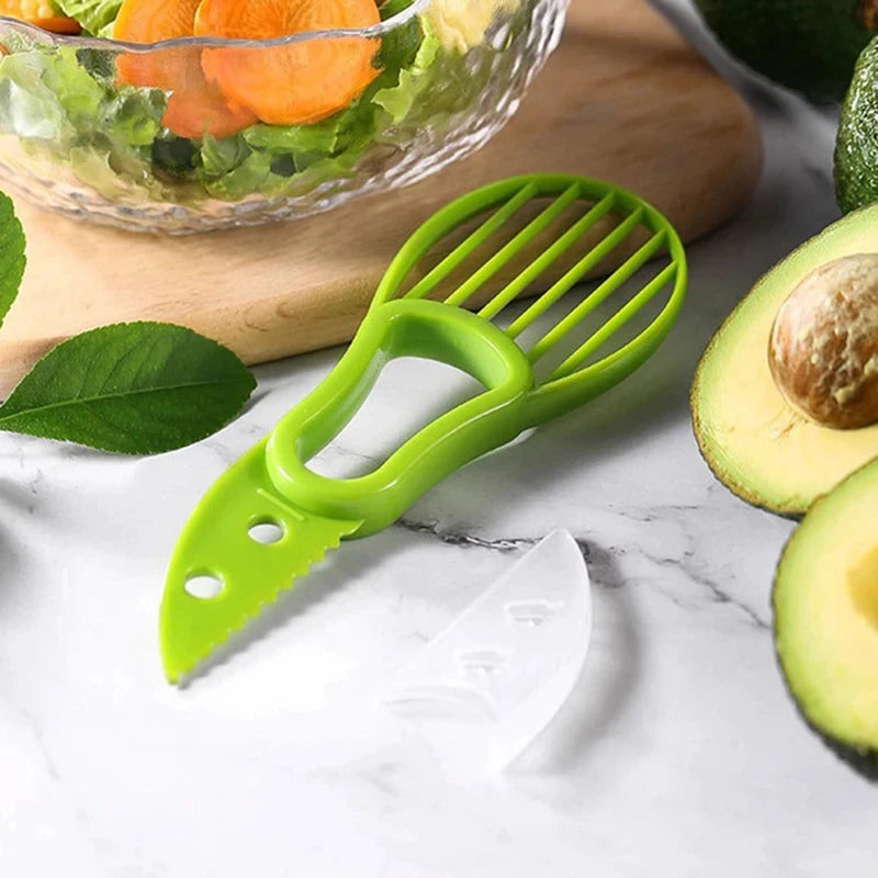 Showlu Smart General 3 in 1 avocado tool with scoop, pitter, and slicer, designed for easy avocado preparation.