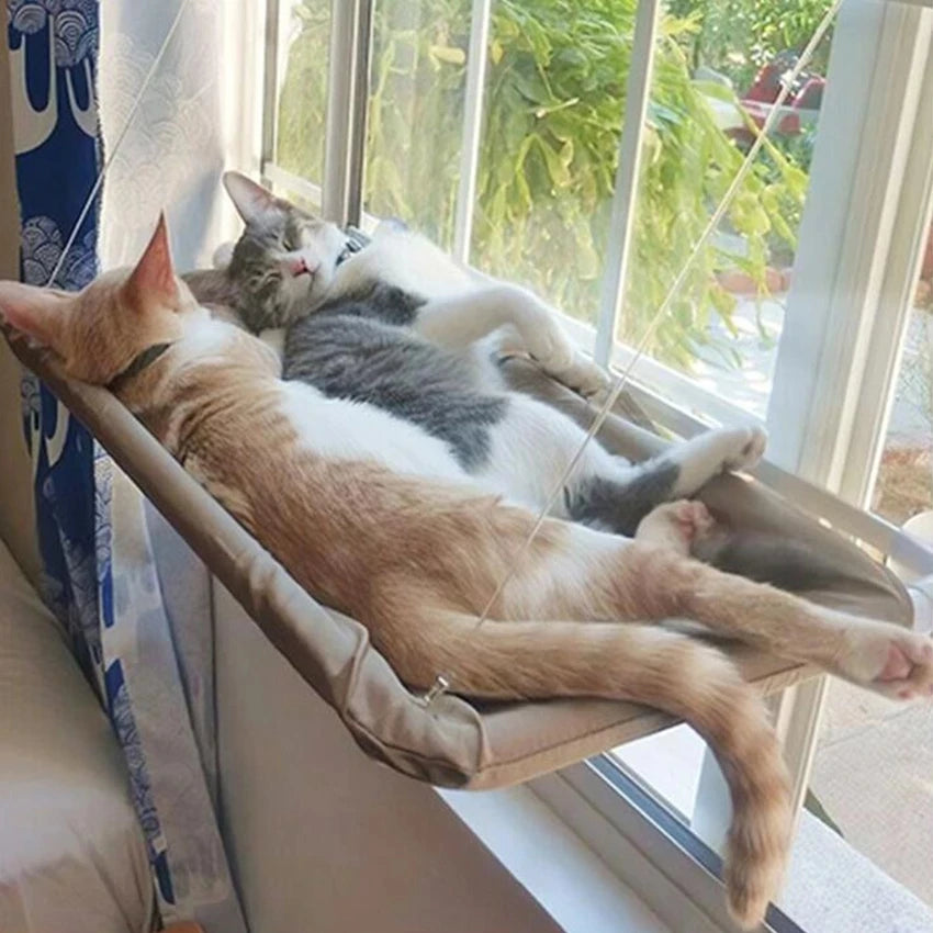 Hanging cat bed by Showlu Fashion, made of Oxford fabric, designed as a window hammock seat for cats to relax comfortably.
