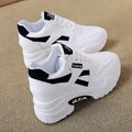 Showlu Fashion women's platform chunky sneakers with PU leather upper and lace-up design, showcasing a stylish and comfortable footwear option.