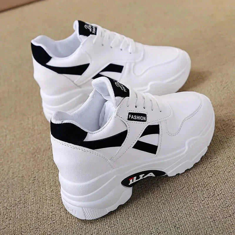 Showlu Fashion women's platform chunky sneakers with PU leather upper and lace-up design, showcasing a stylish and comfortable footwear option.