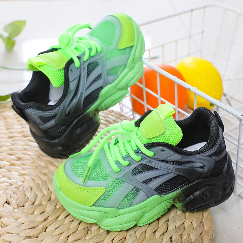 SHOWLU Girls gradient mesh sneakers with lighted platform soles, breathable design, and trendy style for active wear.