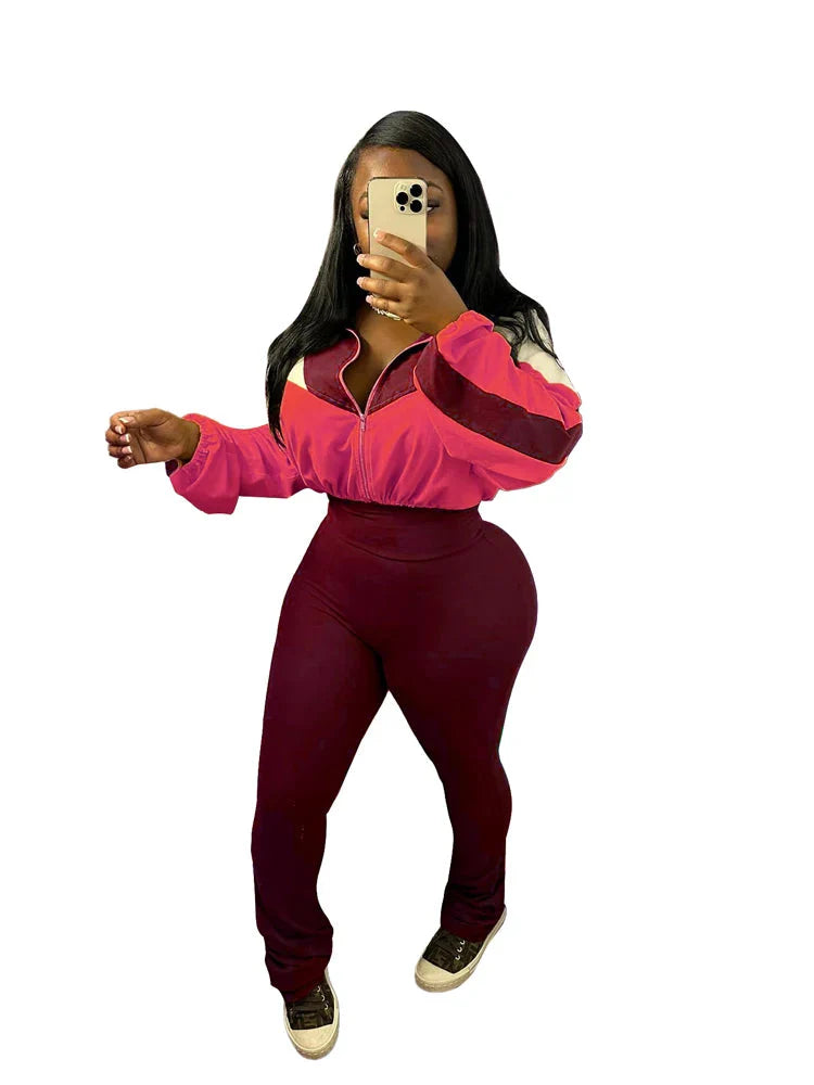 JENYAGE Women's slim fit flare yoga pants and matching crop top tracksuit in black, showing the stylish 2-piece activewear set