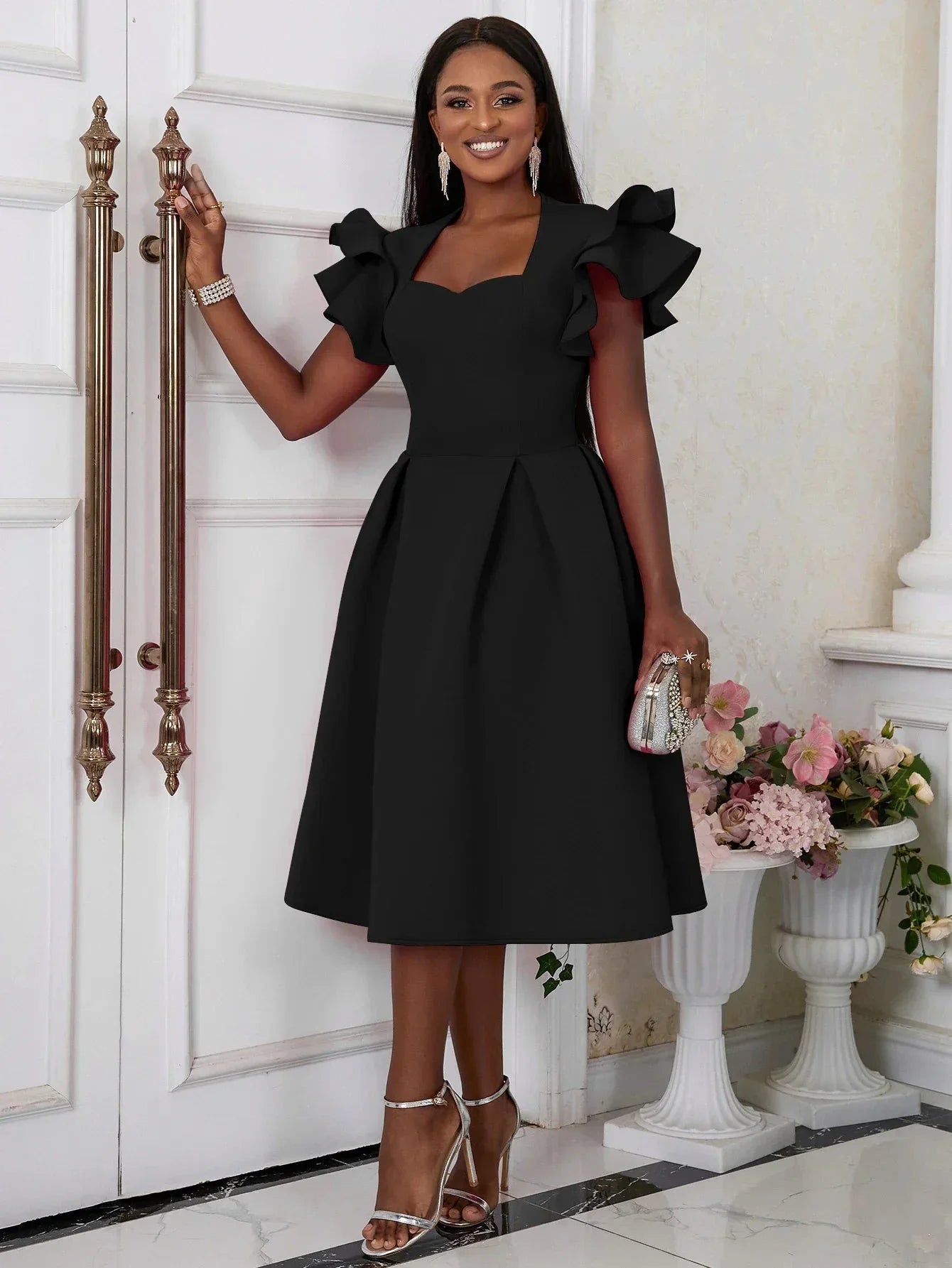 Aimei women's sweetheart neck fit and flare pleated skater dress in black, showcasing its elegant design and flattering silhouette.