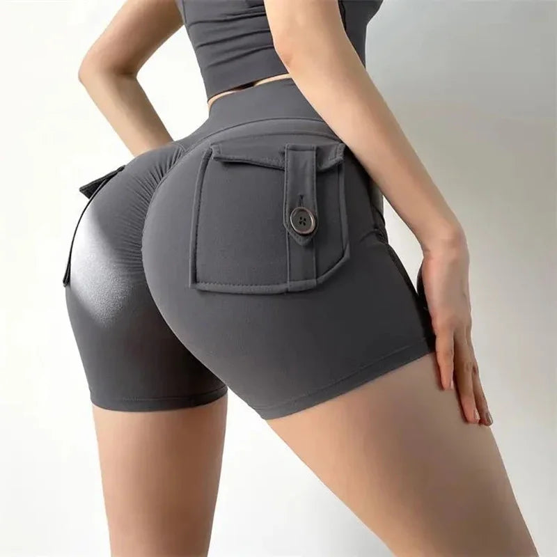 Sanwood women's high waist peach yoga shorts with pockets, designed for comfort and flattering fit for active wear.