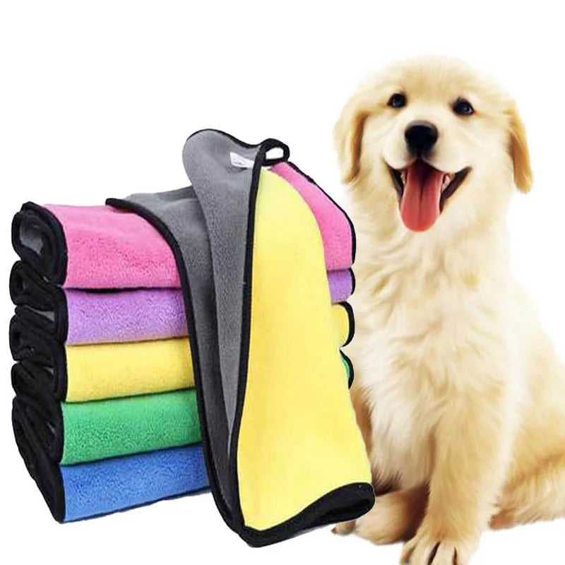 Soft coral fleece pet towel for puppies and cats, quick-drying absorbent bath towel with double-sided cleaning surface.