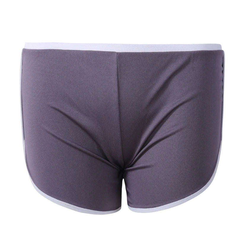 SHOWLU Women's yoga sports shorts made of polyester spandex, featuring a comfortable gym workout pant design.