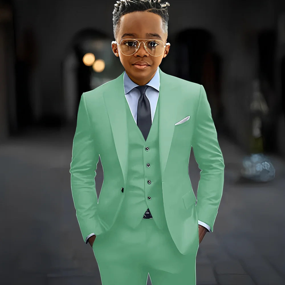 Dark grey boys' suit set featuring a slim fit, single-breasted jacket, pants, and vest with peak lapel from Showlu Fashion Store