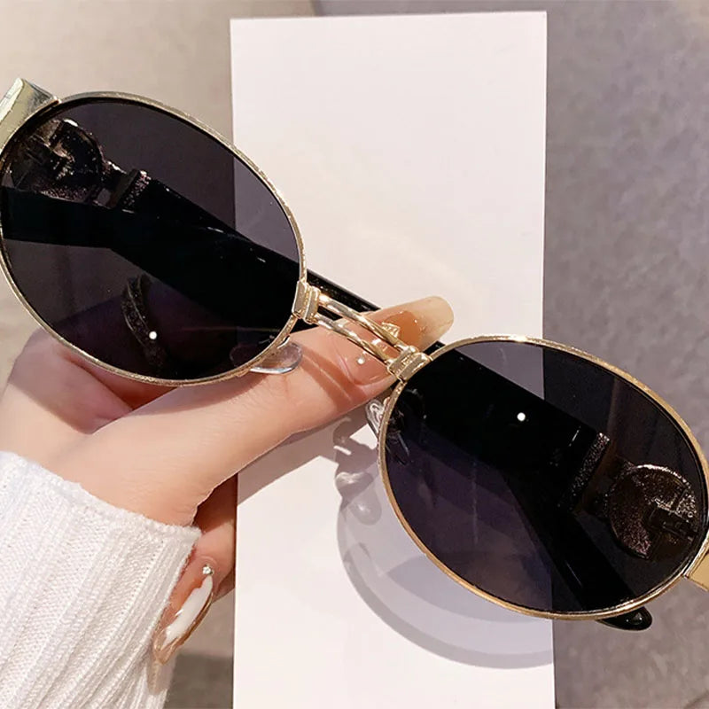 Unisex UV400 fashion oval frame sunglasses with polarized mirrored lenses, stylish protection from Showlu Fashion Store.
