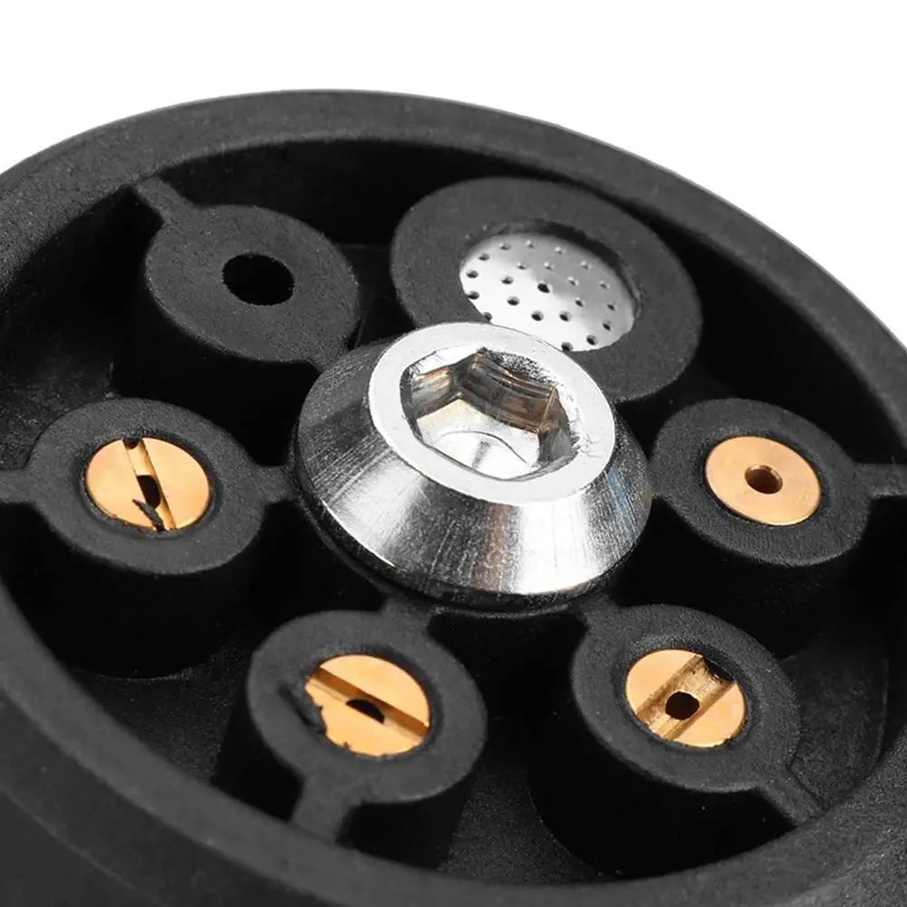 Adjustable 6-in-1 pressure washer nozzle from Showlu Fashion Store showing different spray settings and high-pressure water stream