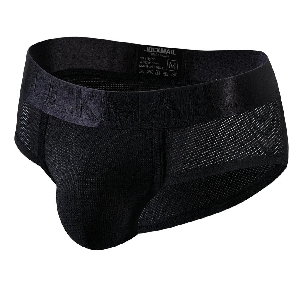 Men's nylon mesh briefs by Showlu Fashion Store, quick-dry solid color underwear with breathable mesh fabric.