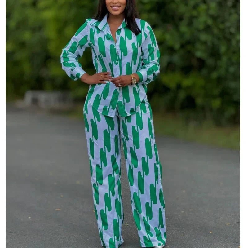 African stripe print two-piece set by SHOWLU FASHION STORE, featuring a long sleeve shirt and wide-leg pants in vibrant patterns.