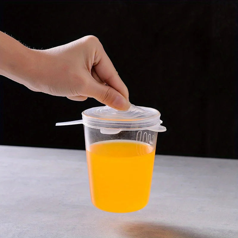 Showlu Smart General silicone stretch lids covering bowls, demonstrating flexible, reusable silicone food storage lids.