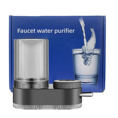 A faucet water purifier with a clear filter housing and a dark grey base sits in front of its box.