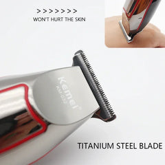A silver electric beard trimmer with a titanium steel blade shown in close-up.